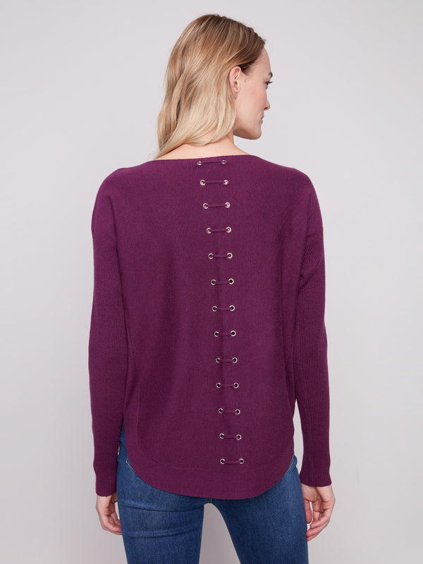 Sophisticated berry sweater showcasing unique back lace-up eyelet details, adding flair by Charlie B.