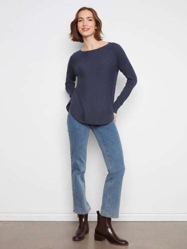 Stylish sweater with rounded hem, offering a chic and comfortable fit for any occasion by Charlie B.