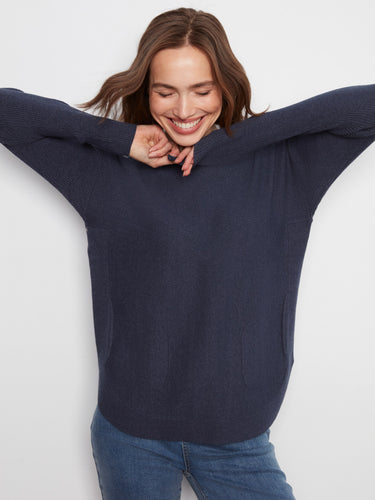 Cozy long ribbed sleeves enhance the classic design of this heather moss knit sweater by Charlie B.