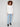 Long ribbed sleeves enhance the sophisticated look of this ecru knit sweater, offering both style and comfort by Charlie B.