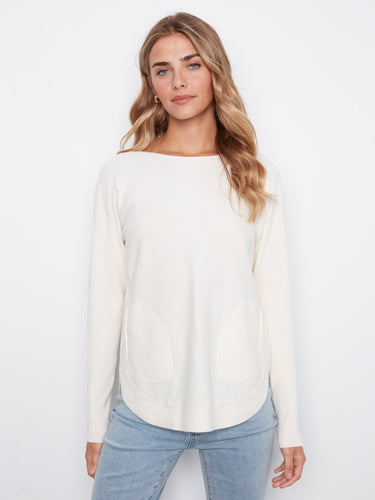Convenient front pockets enhance the practicality of this fashionable sweater by Charlie B.