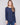 Elegant heather denim sweater featuring a stylish boat neck and ribbed long sleeves, perfect for any occasion by Charlie B.