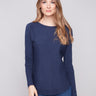 Elegant heather denim sweater featuring a stylish boat neck and ribbed long sleeves, perfect for any occasion by Charlie B.
