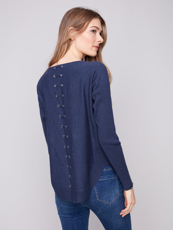 Chic denim knit sweater with unique back lace-up eyelet details, adding a modern twist to your wardrobe by Charlie B.