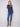 Stylish heather denim sweater designed with convenient front pockets and a flattering fit for everyday wear by Charlie B.