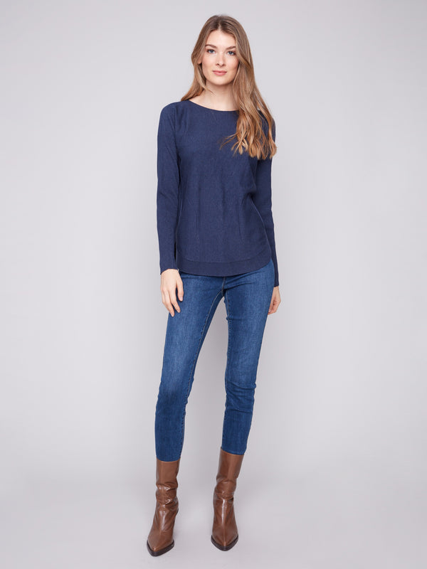 Sophisticated knit sweater in heather denim with a trendy rounded hem, combining comfort and style effortlessly by Charlie B.