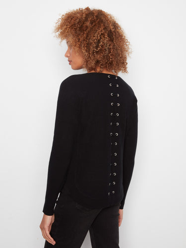 Elegant black sweater showcasing intricate back lace-up eyelet details, enhancing its modern design by Charlie B.