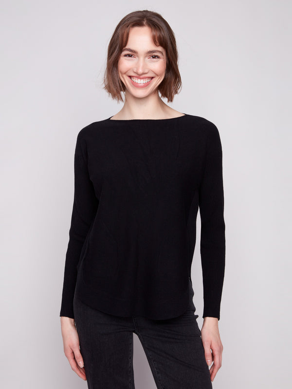 Stylish black knit sweater with a flattering rounded hem that adds a touch of elegance by Charlie B.