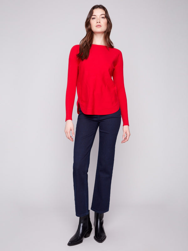 Chic crimson knit sweater with convenient front pockets, ideal for everyday wear by Charlie B.