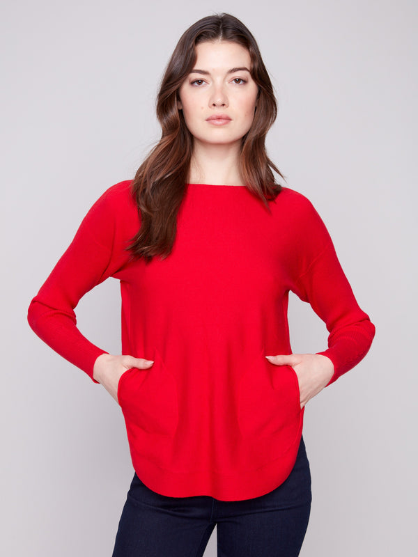 Stylish crimson knit with long ribbed sleeves and rounded hem for added flair by Charlie B.