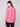 Pink knit sweater showcasing back lace-up eyelet details, adding a unique touch to your wardrobe by Charlie B.