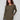 Spruce knit sweater featuring a stylish boat neck and convenient side pockets, perfect for any casual outing by Charlie B.