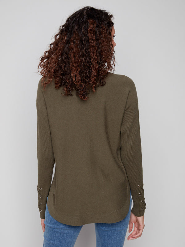 Chic spruce knit sweater showcasing cuff lace-up detail, adding a touch of flair to your look by Charlie B.
