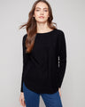 Black knit sweater featuring a stylish boat neck and long ribbed sleeves, perfect for a chic look by Charlie B.