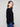 Sophisticated black knit sweater showcasing long ribbed sleeves and cuff lace-up accents for added flair by Charlie B.