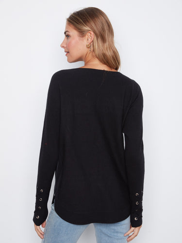 Versatile black knit sweater with a flattering silhouette and comfortable fit, great for everyday wear by Charlie B.