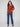 This sepia sweater features a stylish boat neck and long ribbed sleeves by Charlie B.