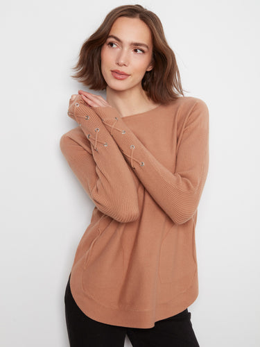 Elegant boat neck sweater with cuff lace-up detail, perfect for a chic look by Charlie B.