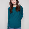 Stylish knit sweater featuring a classic boat neck design, perfect for effortless elegance by Charlie B.