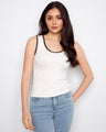 White sleeveless top featuring a stylish scoop neckline, perfect for warm weather outfits. Designed by Charlie B.