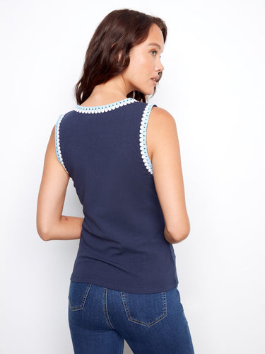 Elevate your style with this navy sleeveless tank, showcasing beautiful crochet details at the neckline by Charlie B.