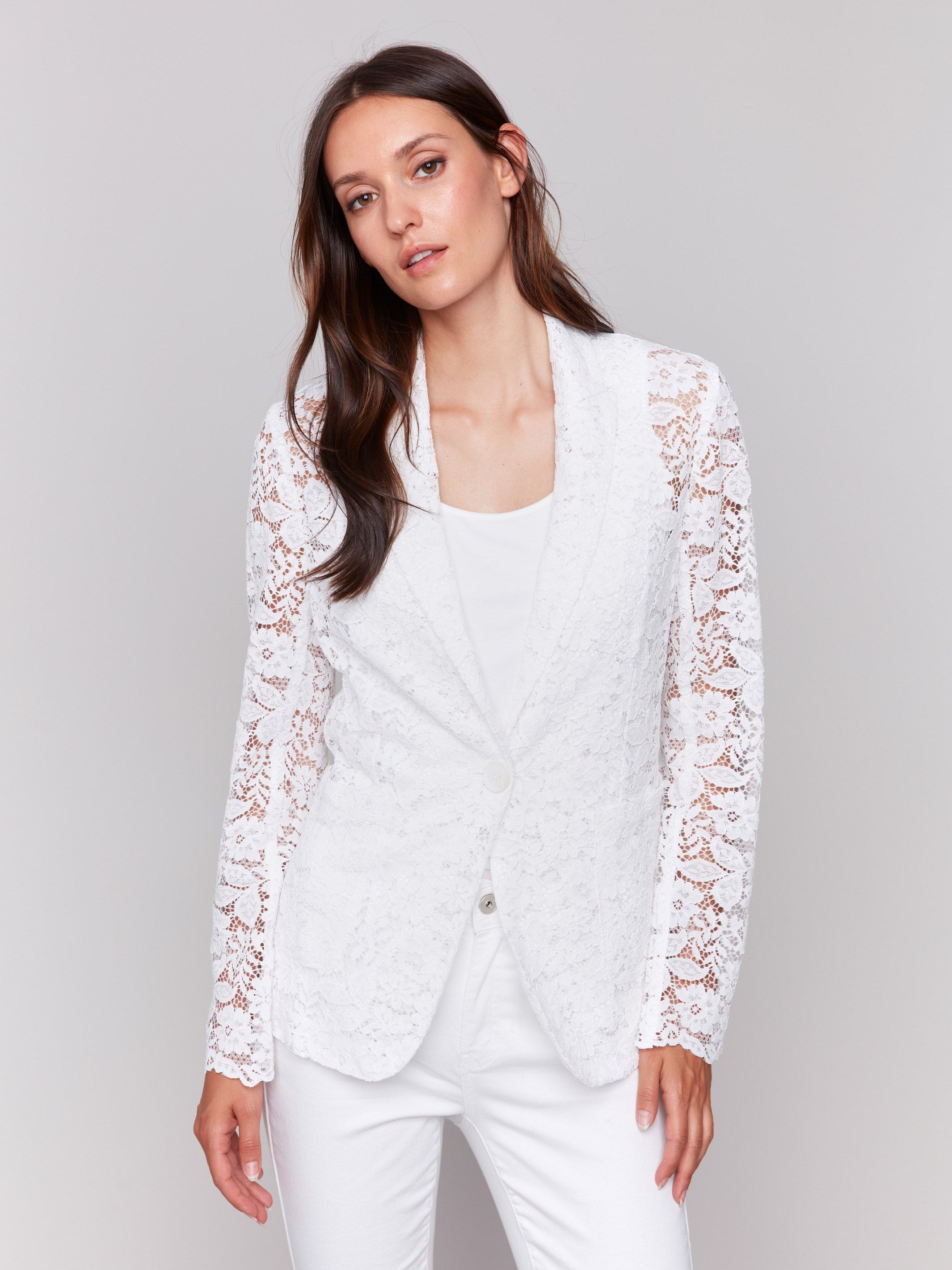 White lace blazer with lapel notch collar, showcasing elegant design by Charlie B.