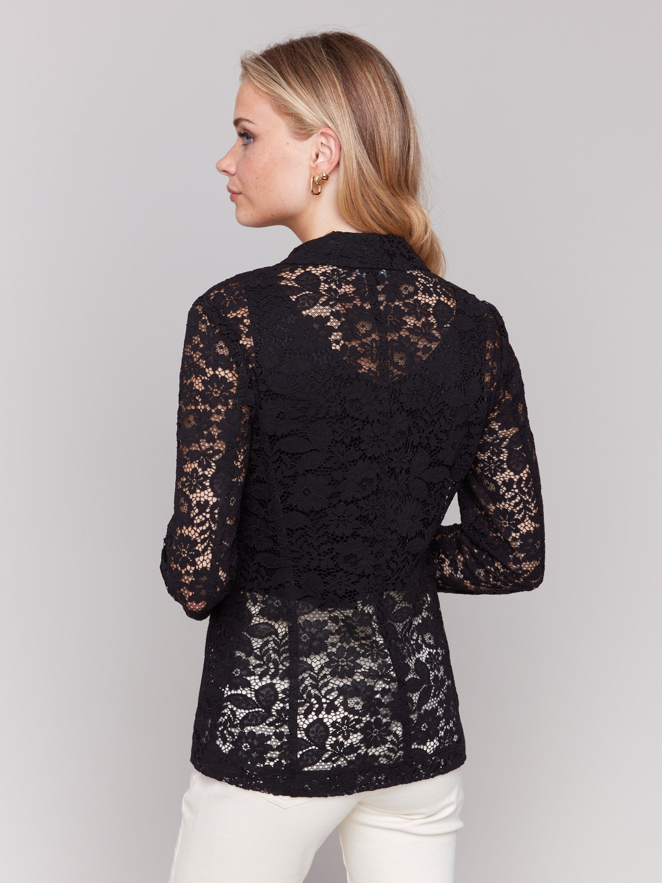 Sophisticated unlined black lace design on this blazer by Charlie B.