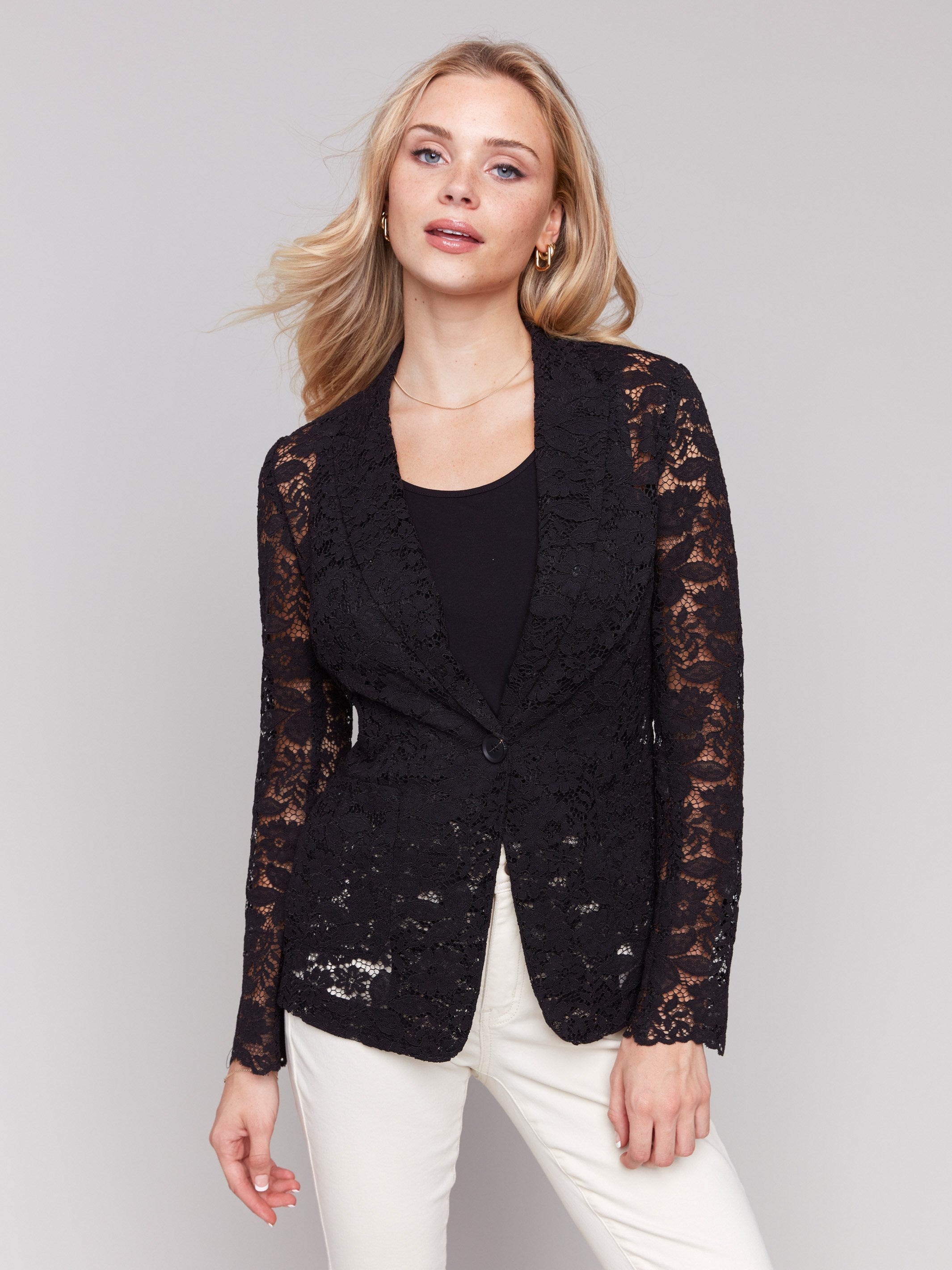 Chic black blazer with two functional front pockets by Charlie B.
