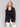 Chic black blazer with two functional front pockets by Charlie B.