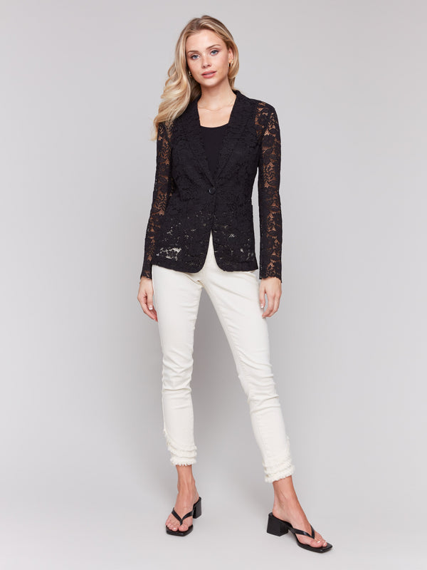 Fashion-forward lace detailing enhancing the lapel collar by Charlie B.