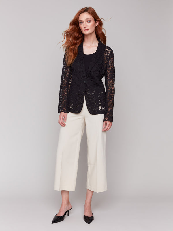 Functional front pockets adding practicality to the chic design by Charlie B.