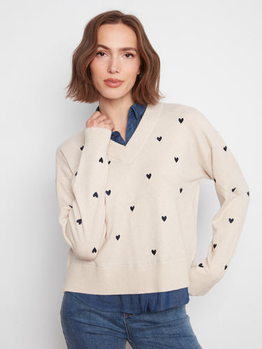 Heather Oat sweater with V-neckline and embroidered hearts, featuring a layered shirt collar by Charlie B.