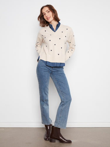 Versatile V-neckline of the Heather Oat sweater enhances its stylish appeal by Charlie B.