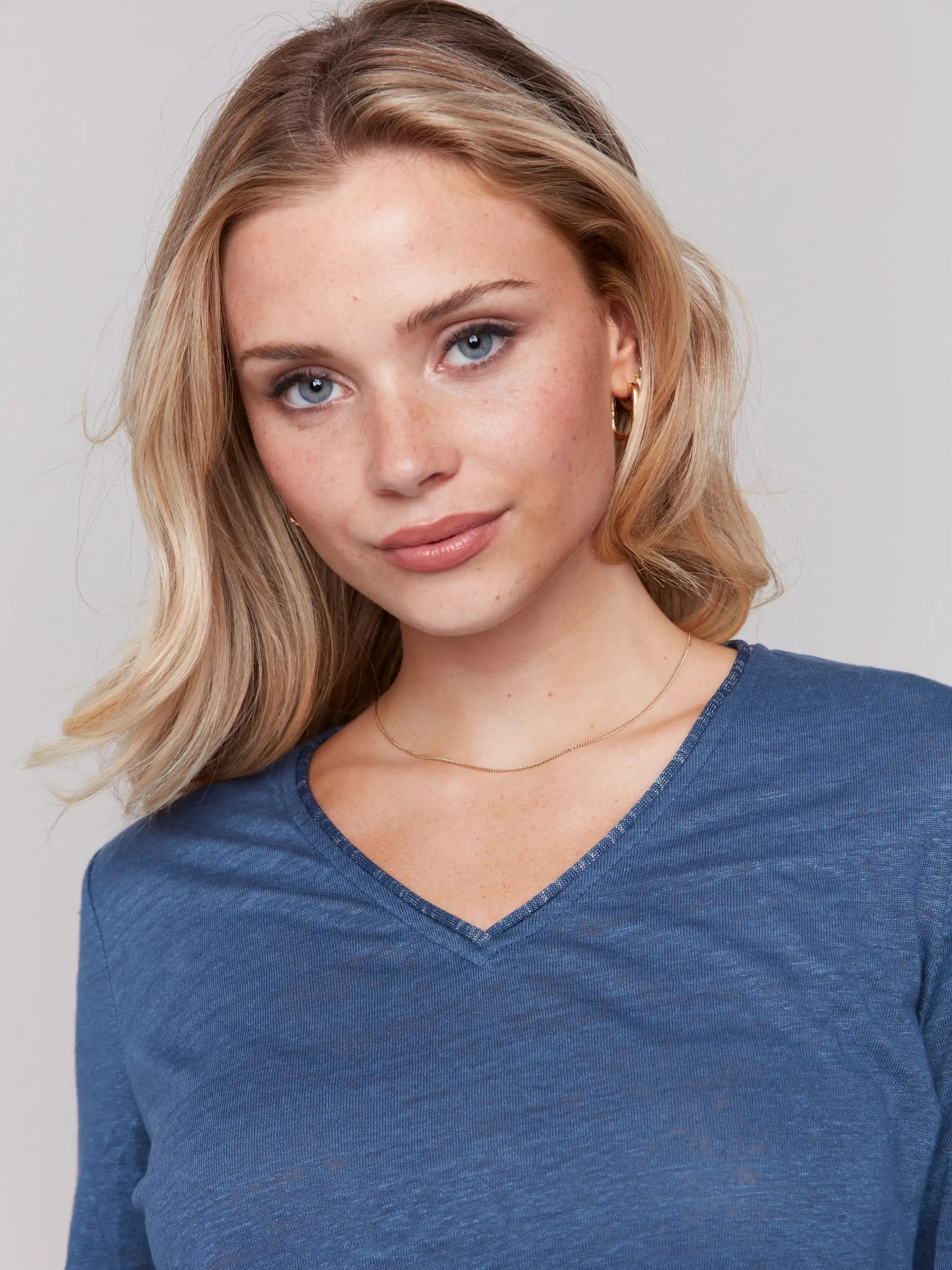 Elegant V-neck design in a comfortable linen blend, by Charlie B.