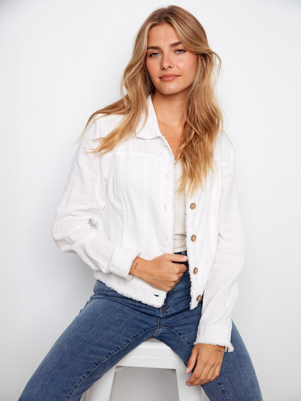 Stylish short-length jacket in white with button detailing for a modern touch. By Charlie B.