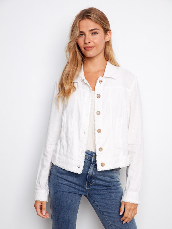 White denim piece designed with attention to detail, including stylish frayed edges and buttons. By Charlie B.