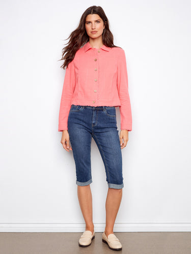 Featuring practical front pockets, this pink jacket combines fashion and functionality effortlessly by Charlie B.
