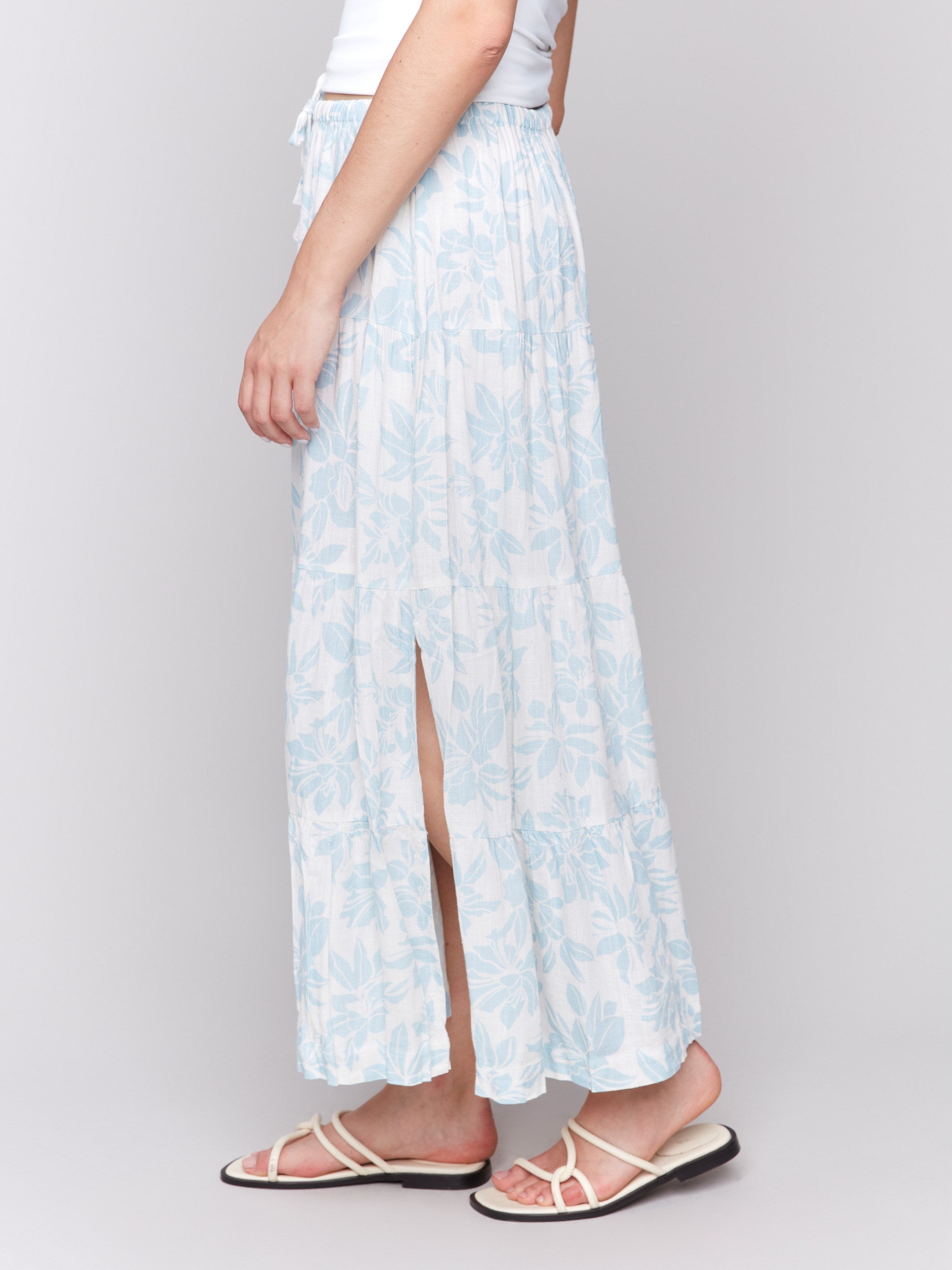 Tiered skirt featuring an elastic waistband and drawstring for comfort by Charlie B.