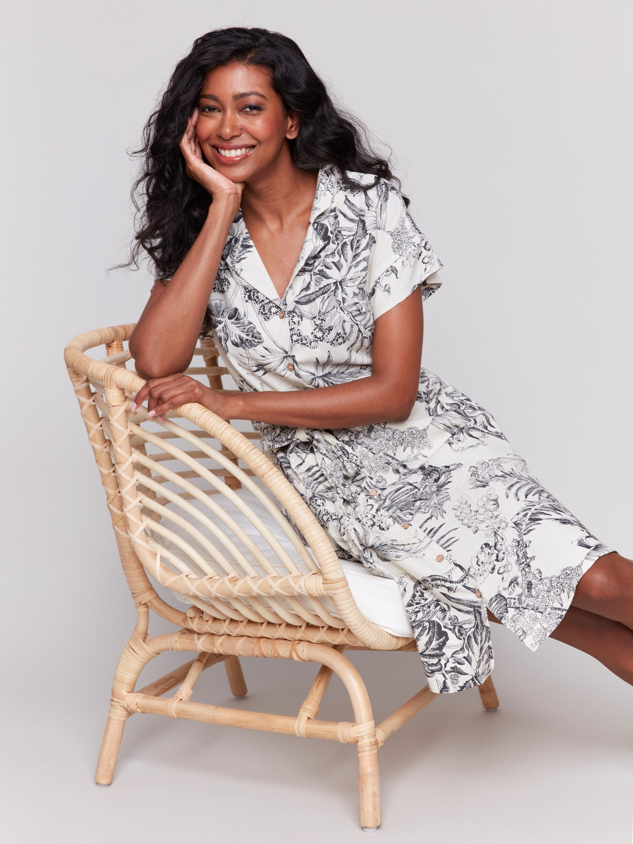 Elegant short sleeve dress with a knee-length design by Charlie B.