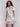 Chic dress with button-front closure and abstract pastel pattern by Charlie B.