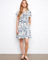 Linen-blend dress featuring a classic shirt collar and blue floral print, complete with short sleeves by Charlie B.