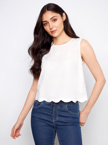Stylish sleeveless design in a classic white color for summer days, by Charlie B.