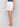 Regular rise design in white linen shorts by Charlie B.