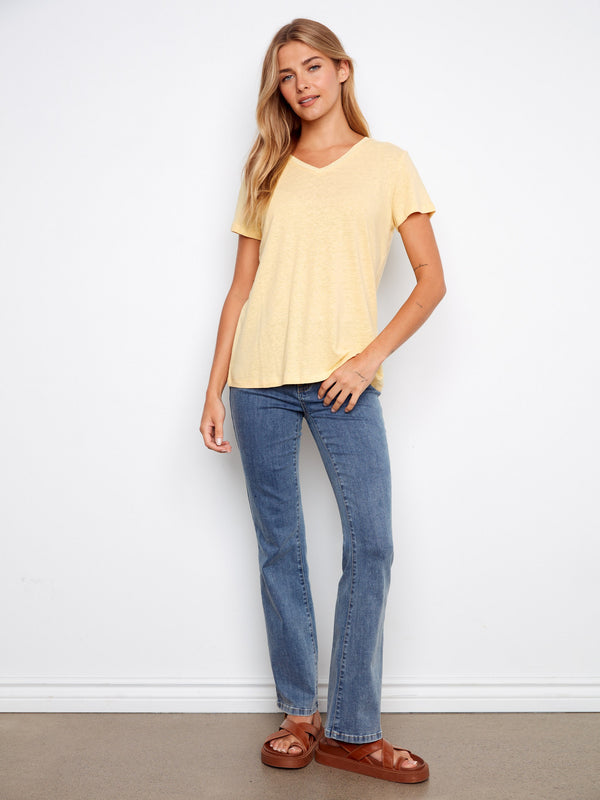 Embrace comfort with this relaxed fit T-shirt in a gentle yellow shade. Styled by Charlie B.