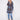Crochet coat in twilight with tailored collar, showcasing a geometric pattern and welt pockets on front by Charlie B.