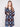 Stylish twilight crochet coat with welt pockets on front, adorned with a striking geometric pattern by Charlie B.