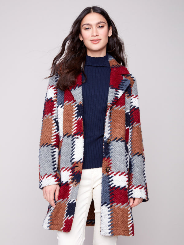 Crochet coat in vibrant plaid with a tailored collar, offering a stylish and cozy addition to any wardrobe by Charlie B.