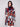 Unlined crochet coat in a striking plaid pattern, designed with button closure for easy wear and versatility by Charlie B.