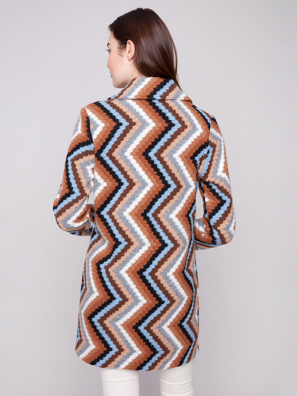Geometric patterned crochet coat in sepia with button closure, offering a chic style by Charlie B.