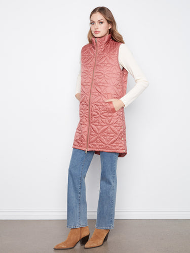 Fashionable rosebud-colored puffer vest offering a comfortable relaxed fit with stylish detailing by Charlie B.